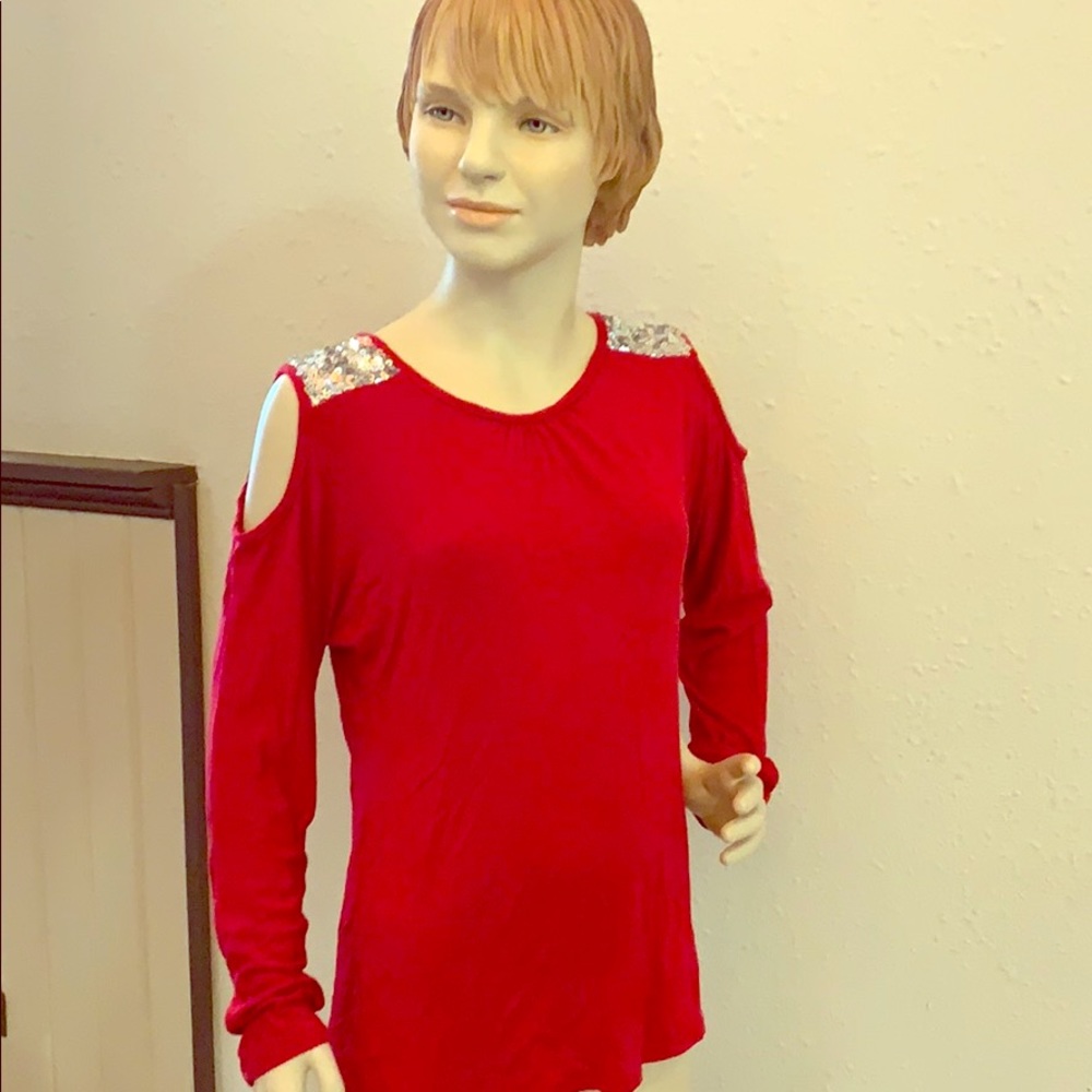 A shirt with slots on the arms